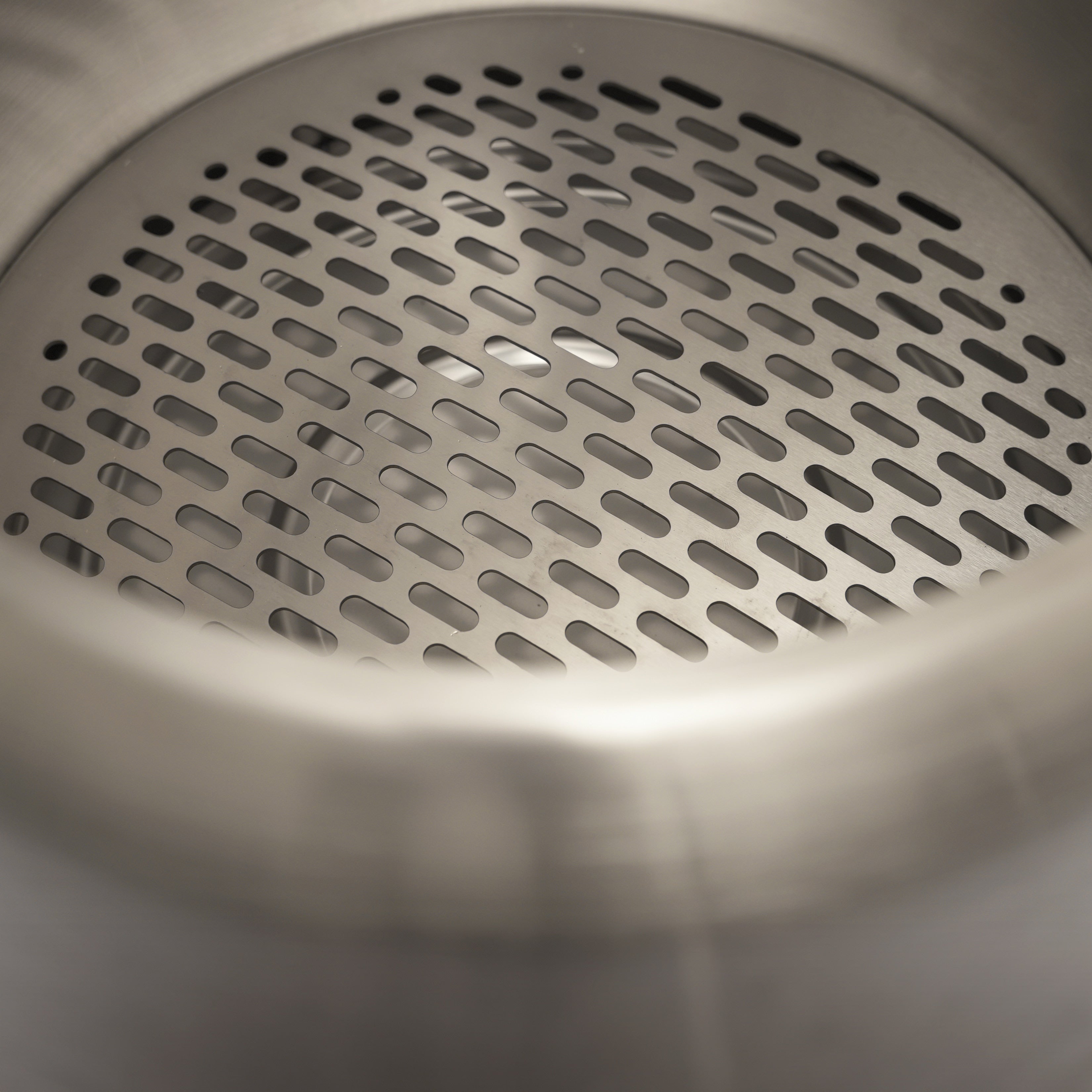 Internal view of the Ecoflame smokeless fire pit displaying its air vents resulting in minimal smoke