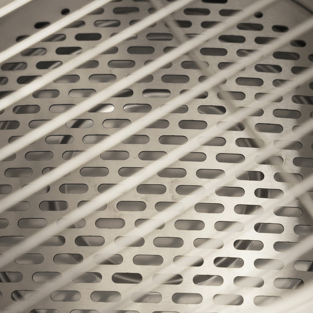 Internal view of the Ecoflame smokeless fire pit and cooking grill