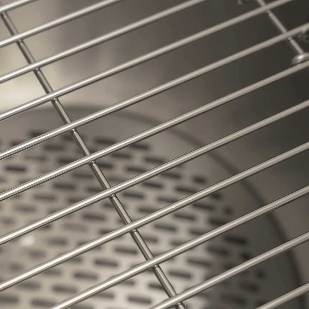 Close up of the Ecoflame smokeless fire pit cooking grill