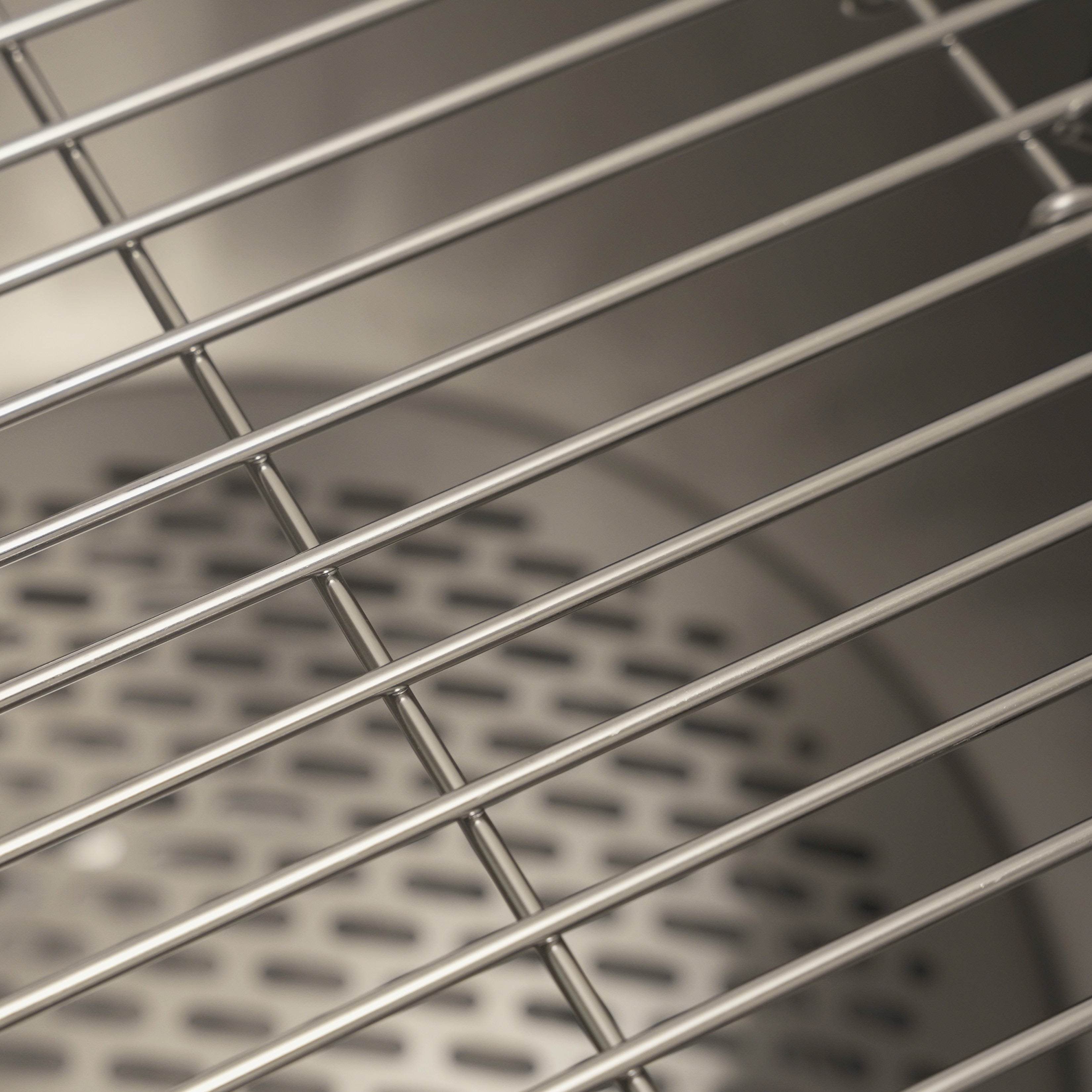 Close up of the Ecoflame smokeless fire pit cooking grill