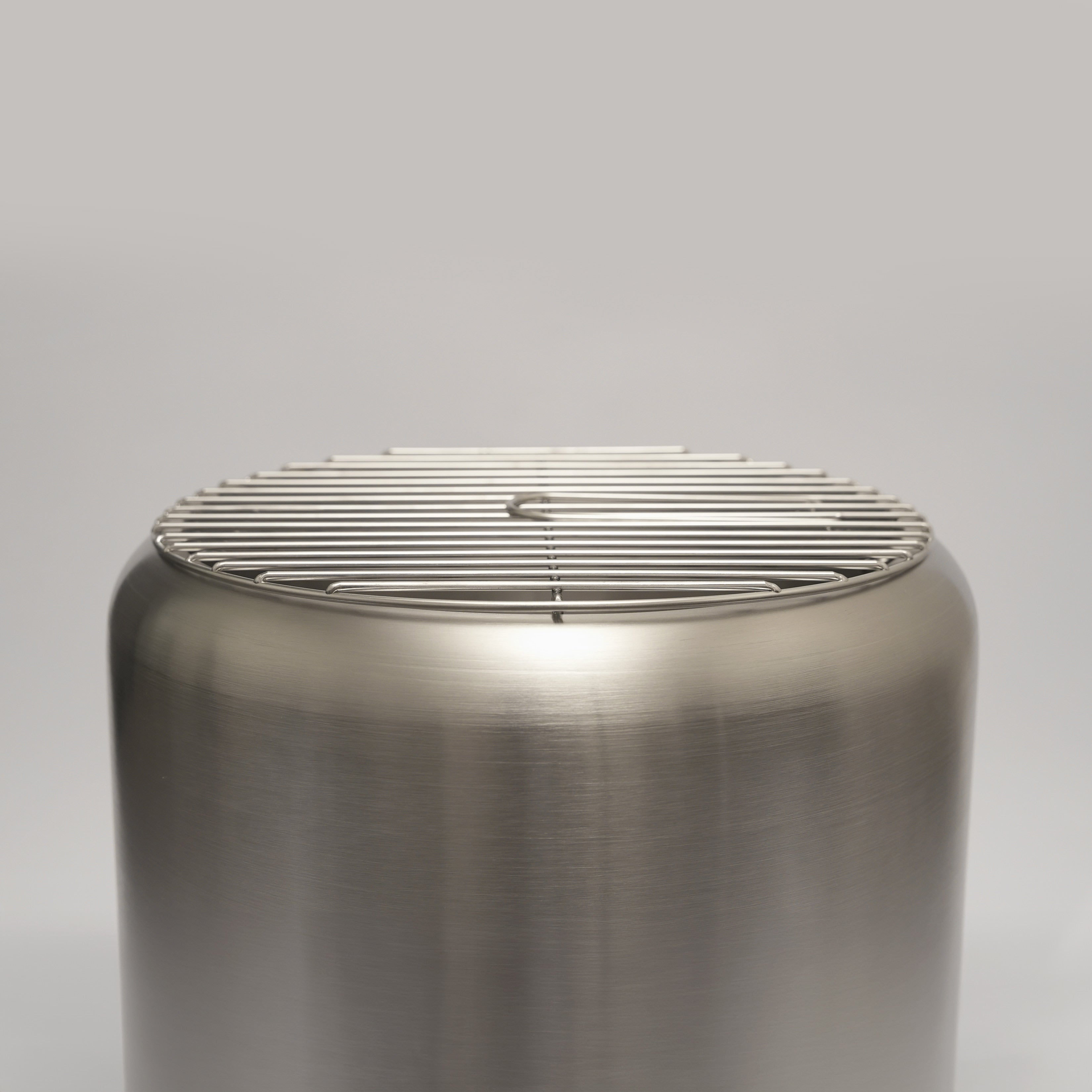 Close up of the Ecoflame smokeless fire pit and cooking grill