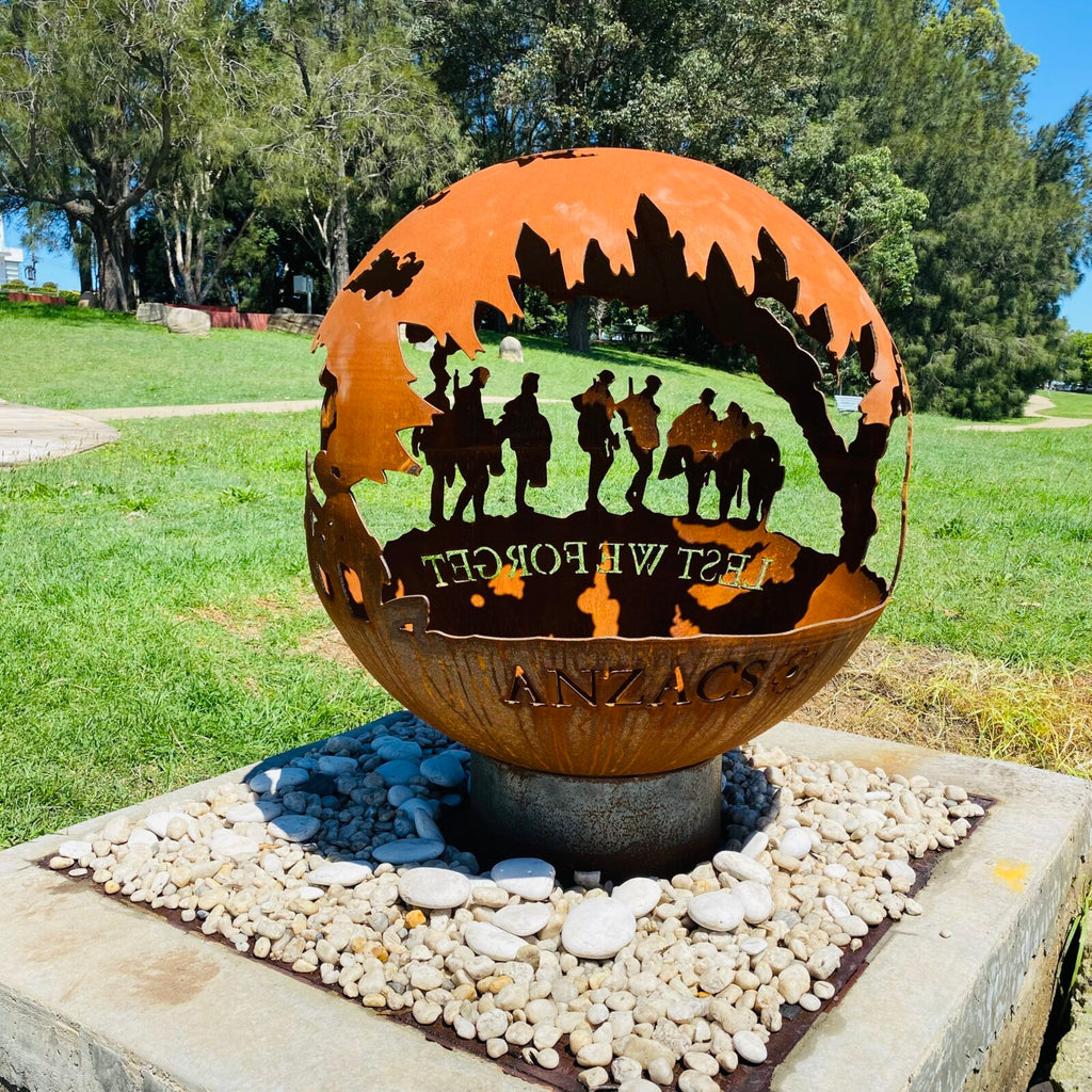 THE ANZAC fire ball fire pit on a grassy area