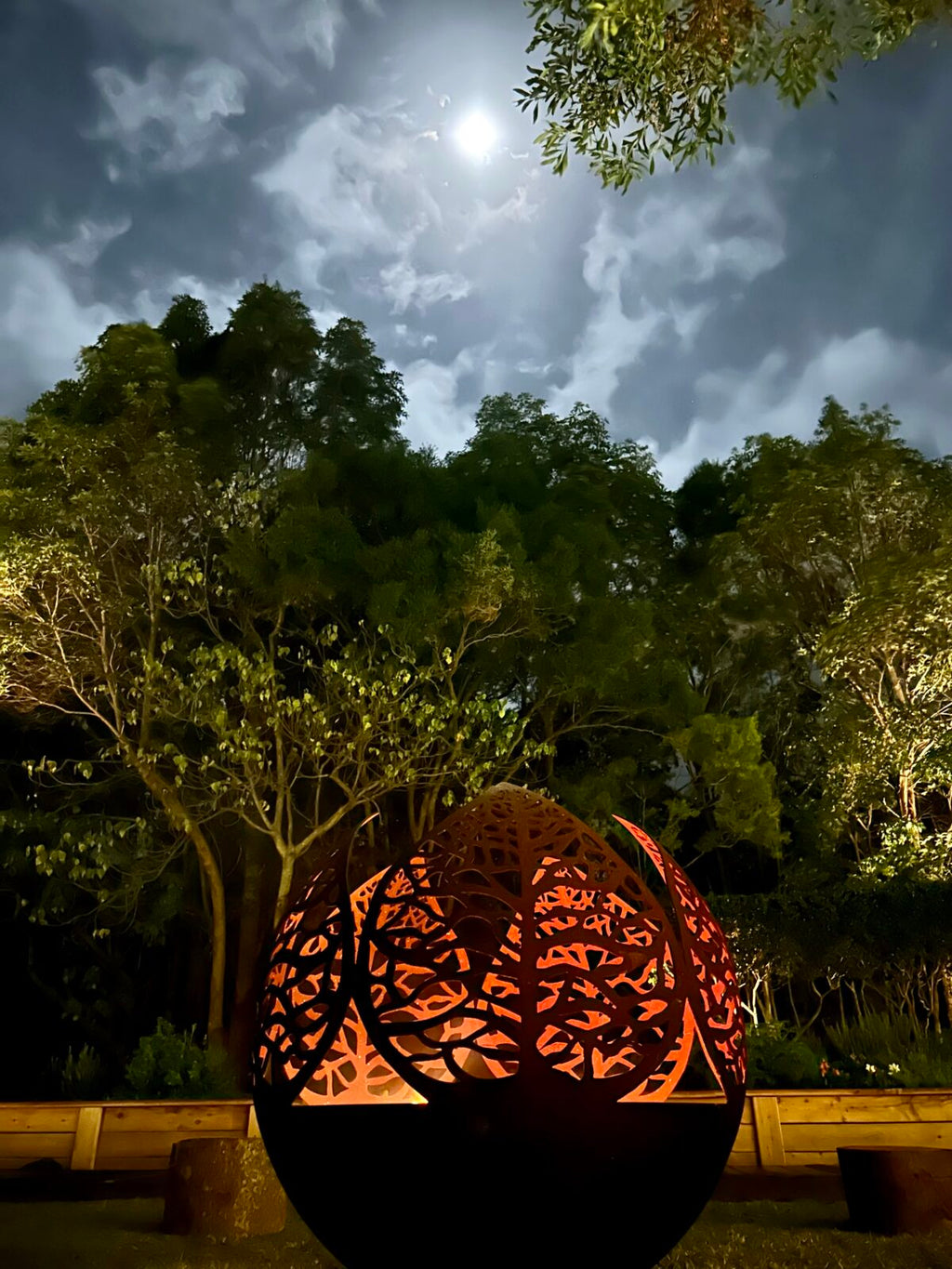 The Leaf Sphere Fire Pit in use