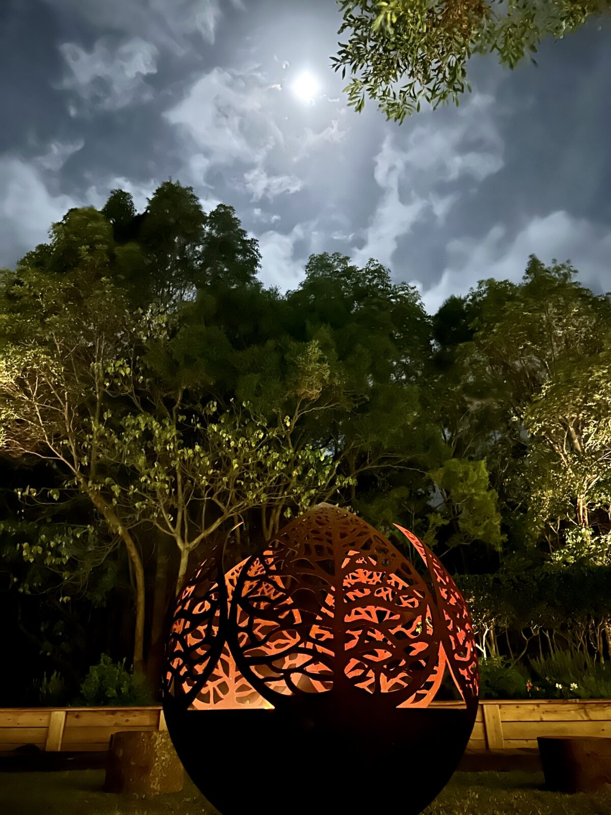 The Leaf Sphere Fire Pit in use