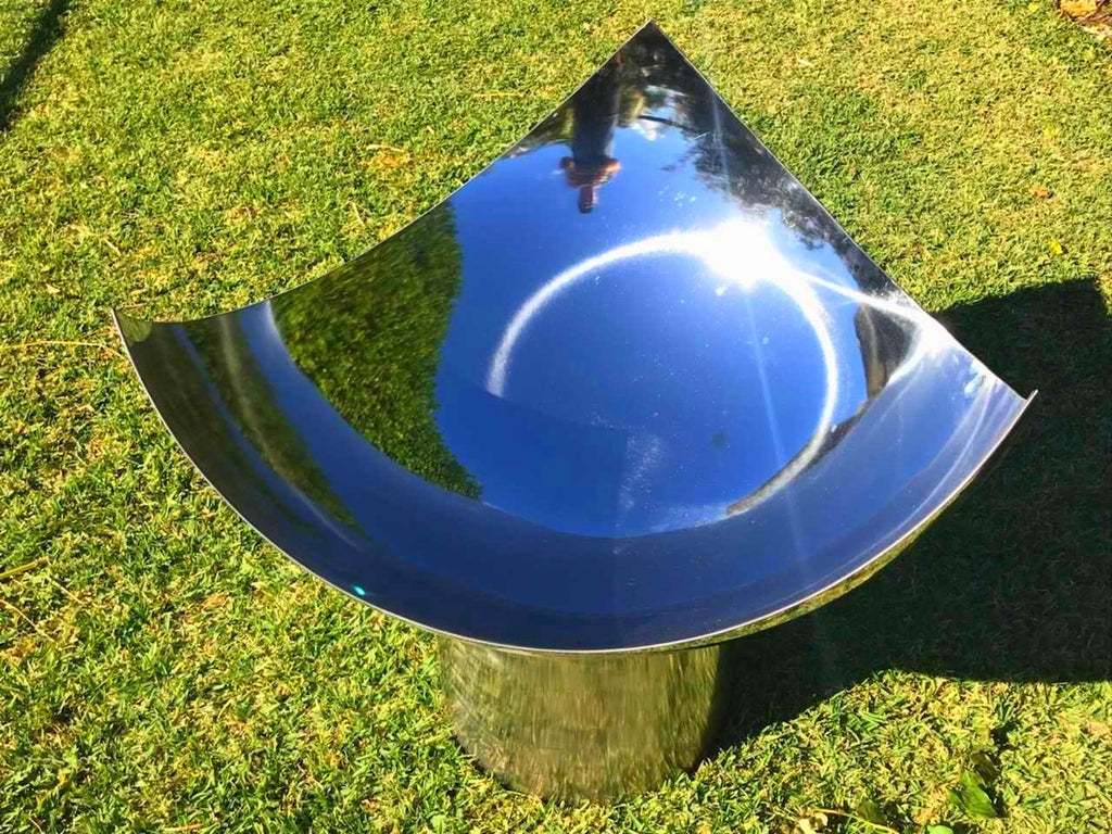 The Chalice Fire Pit - Stainless Steel on grass - top view