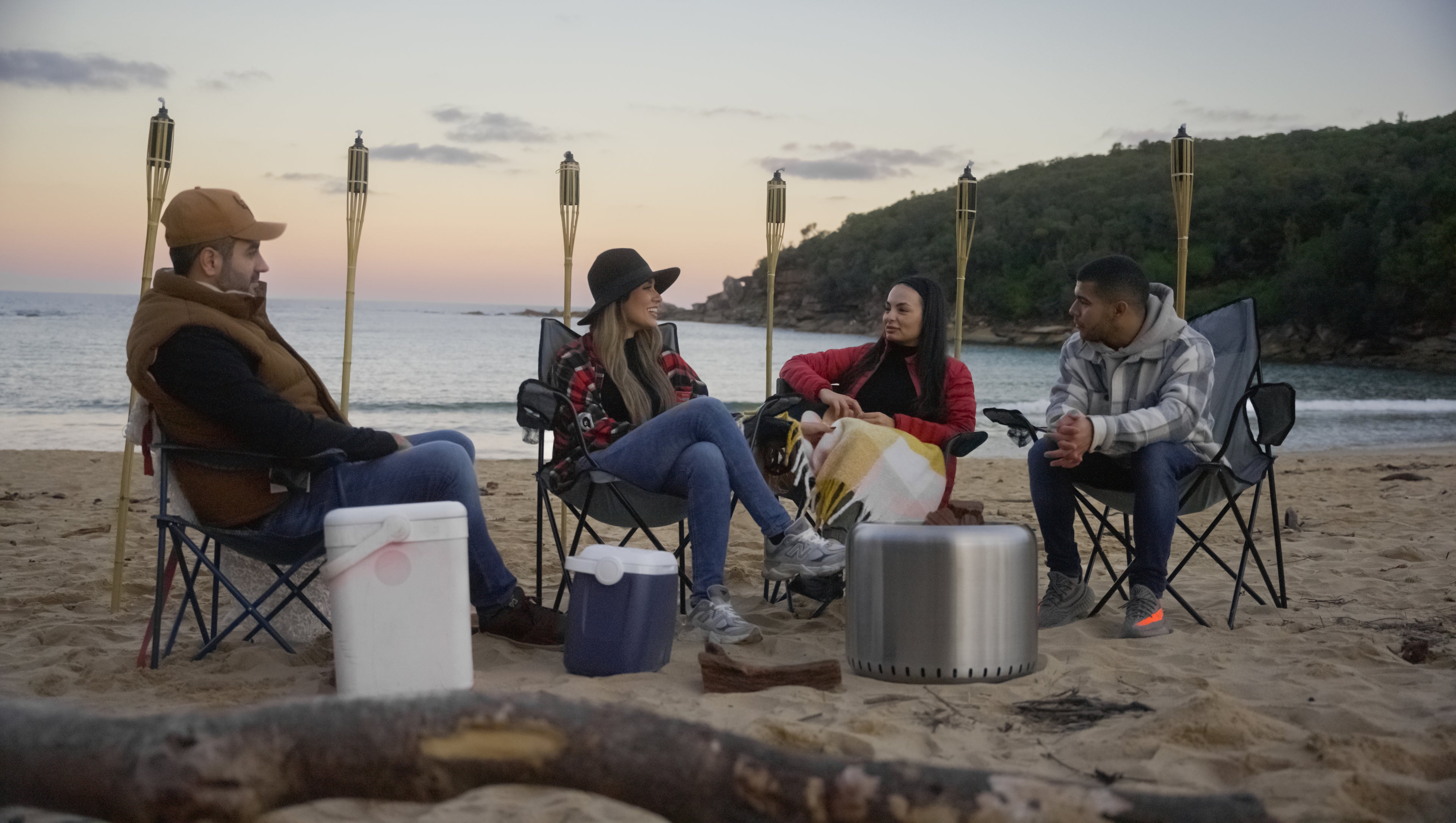Gathering around the Ecoflame Smokeless fire pit