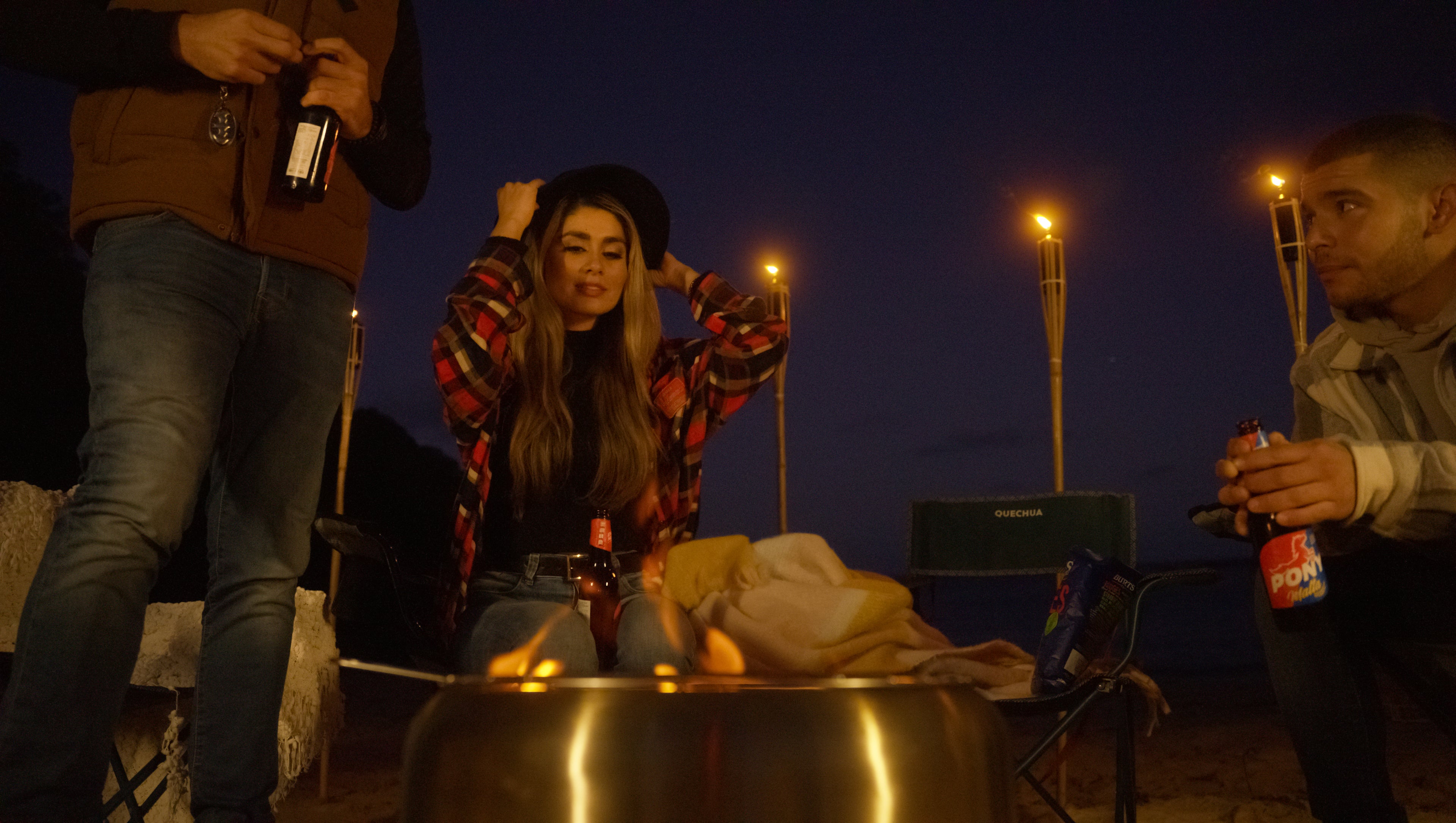 People gathering around the Ecoflame Smokeless fire pit