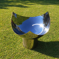 The Chalice Fire Pit - Stainless Steel on lawn