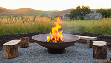 Load image into Gallery viewer, 1200mm cast iron fire pit in rural setting
