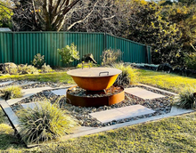 Load image into Gallery viewer, Metal Fire Pit Lid on the Cauldron Fire Pit
