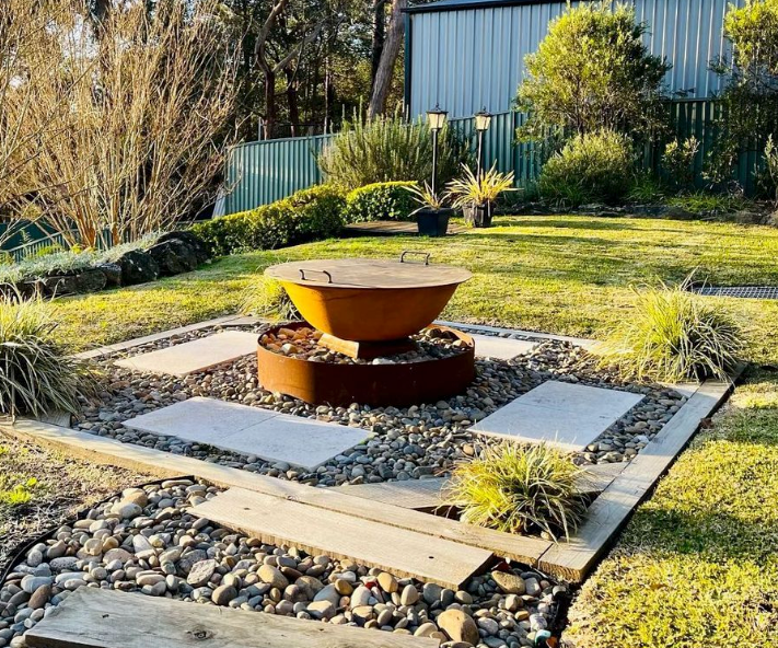 Metal fire pit lid on the fire pit