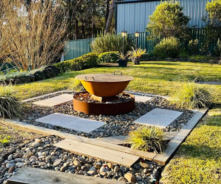 Metal fire pit lid on the fire pit